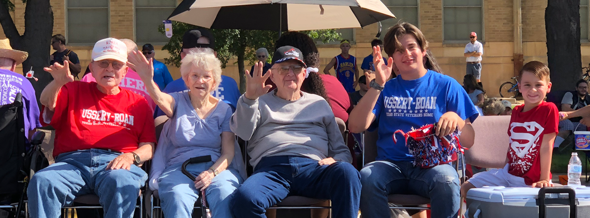 Veterans sitting with their families