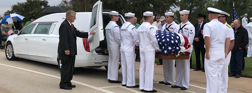 Veterans carrying coffin