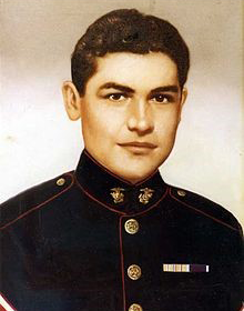 A photograph of a person in uniform.