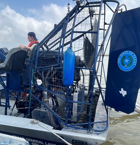 Commissioner Buckingham surveys the damage caused by an oil spill after a barge collided with the Pelican Island Bridge in Galveston last week.