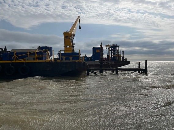 Plugging barge onsite at orphan well in Trinity Bay