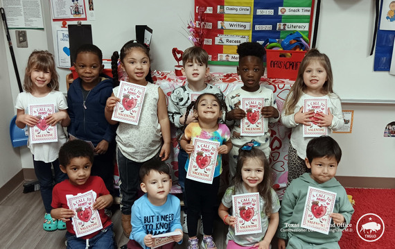 School children display their Valentines for Vets cards