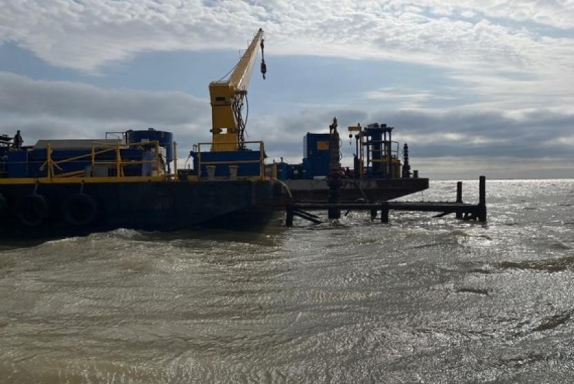 Plugging barge onsite at orphan well in Trinity Bay