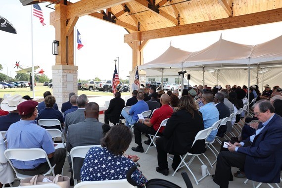 Commissioner Dawn Buckingham, M.D. speaks at the P-51C Mustang Replica Aircraft Unveiling