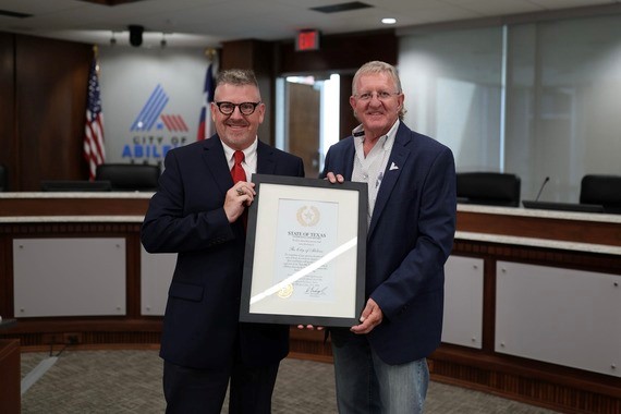 LB Executive Director Tony Dale and Abilene Mayor Weldon Hurt pose following the city's donation of 115 acres of land to the Texas State Veterans Cemetery at Abilene